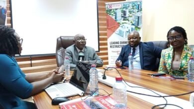 Mr Addo (head of table) addressing the media
