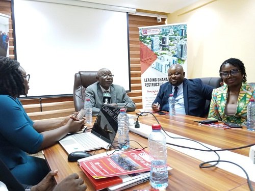 Mr Addo (head of table) addressing the media