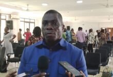 Mr Blay (inset) addressing the gathering