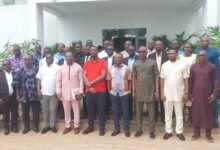 Mr Quaye (fourth from left) and Mr Kotei (fifth from right) with participants at the conference