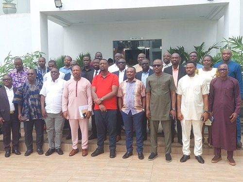 Mr Quaye (fourth from left) and Mr Kotei (fifth from right) with participants at the conference