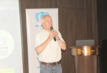Dr Luc Boerboom (inset) making a presentation at the meeting. Photo. Ebo Gorman