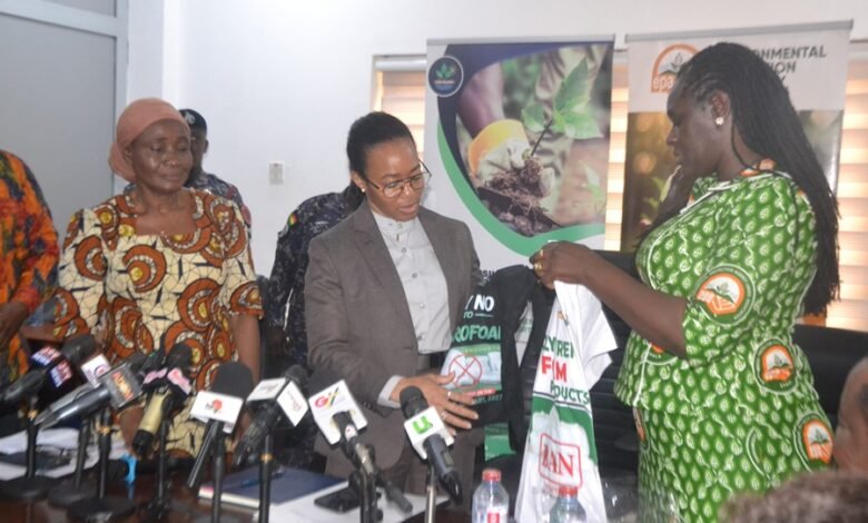 Prof. Klutse (right) presenting printed T-Shirts to Dr Agyemang-Rawlings during the visit Photo Victor A. Buxton