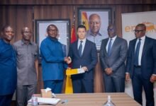 Mr John Jinapor (third from left) exchanging the MoU with officials from Vitol Upstream Tano Ltd