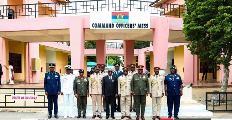 The eight retiring officers and some dignitaries at the pregramme
