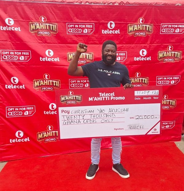 Mr Akussah after receiving his prize