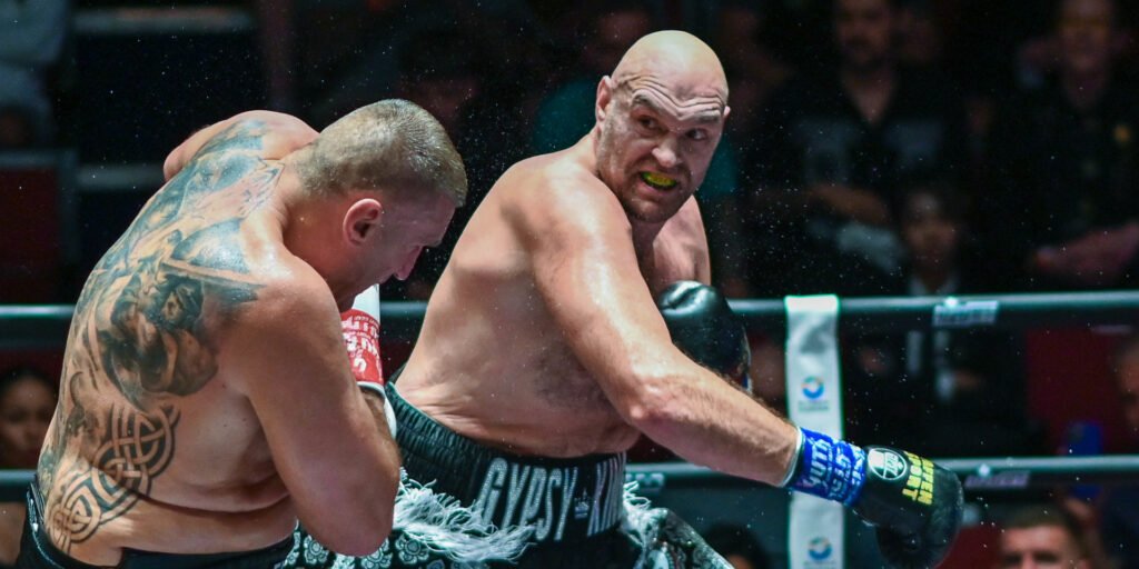 Fury landing a punch against Polish veteran Mariusz Wach in his last bout