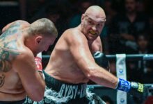Fury landing a punch against Polish veteran Mariusz Wach in his last bout