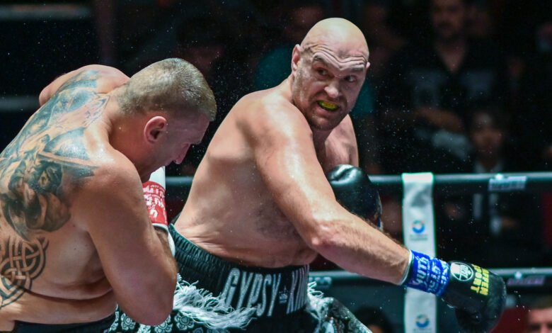 Fury landing a punch against Polish veteran Mariusz Wach in his last bout