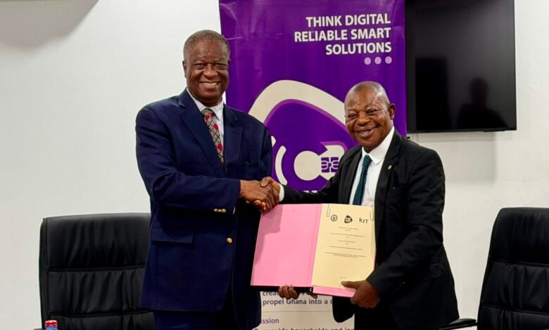 Professor Malcalm (right) and Dr Kludjeson displaying the signed MOU