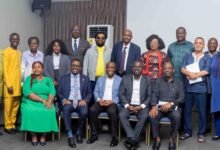 Mr Ofosu Kwakye (seated middle), Mr Dwumfour (seated second from right) and Mr Omar Faruk Osman (seated second from left) with some participants after the meeting