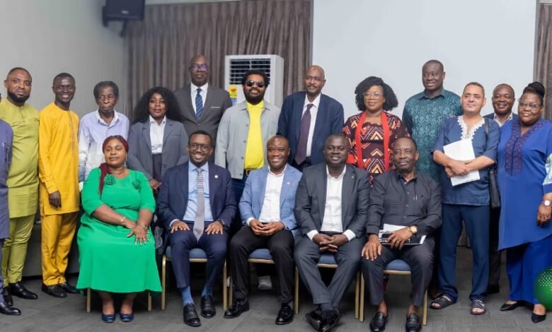 Mr Ofosu Kwakye (seated middle), Mr Dwumfour (seated second from right) and Mr Omar Faruk Osman (seated second from left) with some participants after the meeting