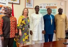 Mr Iddrisu (middle) with Dr Casely Hayford (second from left) and other partners after the meeting