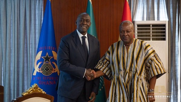 President Mahama (right) welcoming Makhtar Diop at the Jubilee House in Accra