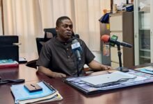 Dr Okyere addressing the media