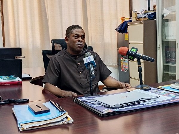 Dr Okyere addressing the media