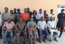 Mr Semorde (seated second from right) with other participants at the programme