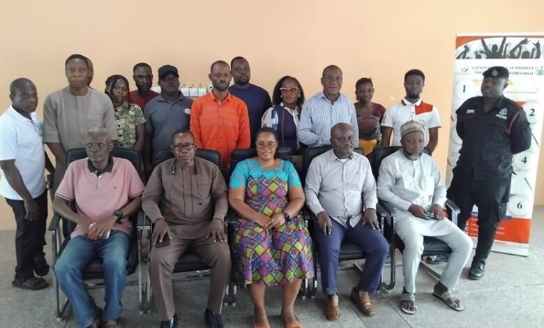 Mr Semorde (seated second from right) with other participants at the programme