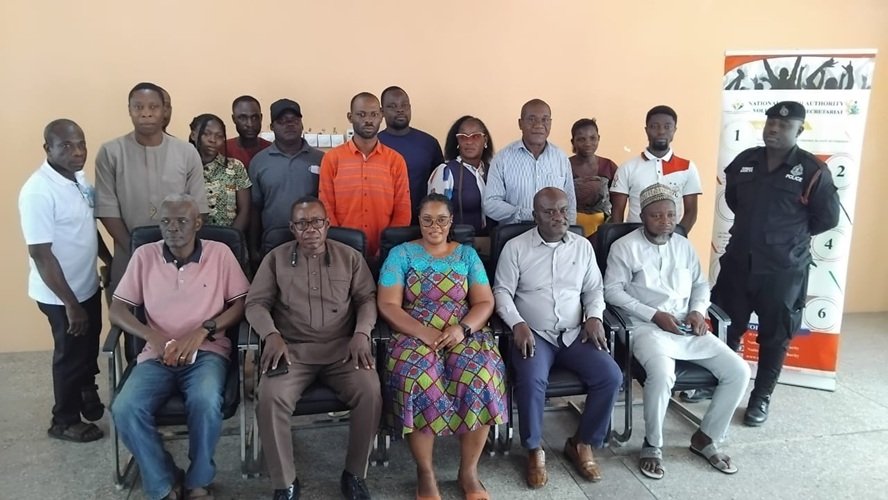 Mr Semorde (seated second from right) with other participants at the programme