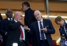 Jesper Moller (left) with Gianni Infantino