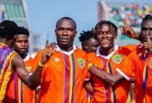 John Antwi joined by team mates to celebrate the opener