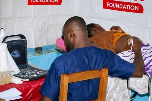 A beneficiary undergoing an ultrasound scan