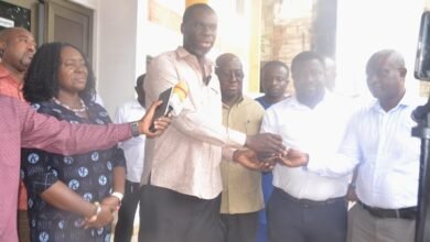 Mr Anyetei (second from left) presenting the keys to the vehicles to Officers from the departments. With them is Ms Rita Sowah Photo Victor A. Buxton