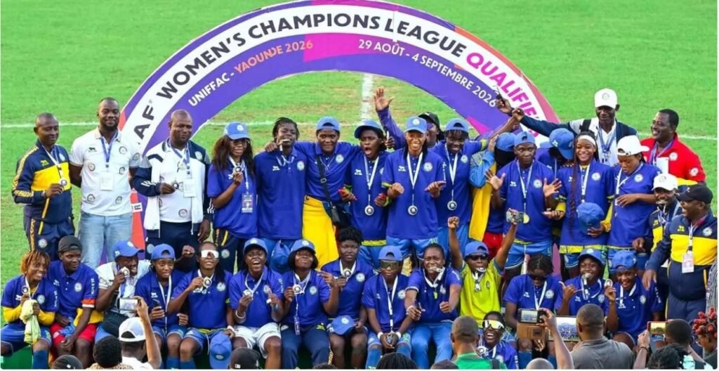Lekkie FF players and officials display their medals after qualifying for the main Champions League