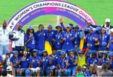 Lekkie FF players and officials display their medals after qualifying for the main Champions League