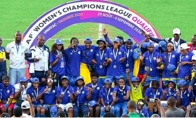 Lekkie FF players and officials display their medals after qualifying for the main Champions League