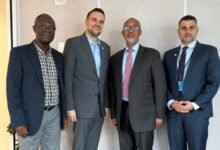 Mr Mould (second from right) with MCC partners at the meeting