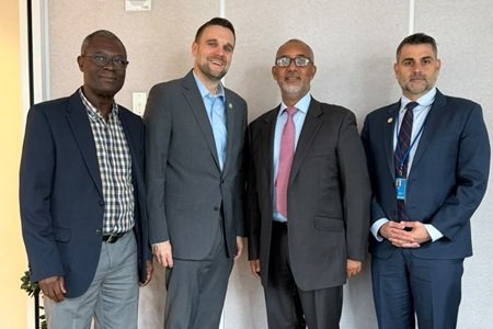 Mr Mould (second from right) with MCC partners at the meeting