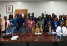 Mr Agyekum together with dignitaries and staff of the Labour Commission after the meeting