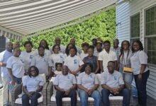 Mr Hometorwu (seated second from left) with members of the association