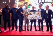 Officials of TCL displaying one of the TCL brands