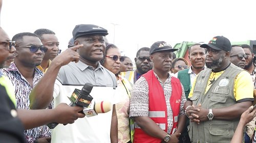 Mr Ahmed Ibrahim briefing the press during his working visit to Kaneshie Market .JPG