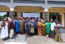 Mrs Kpe (fifth from right) with the couples and dignitaries after the programme