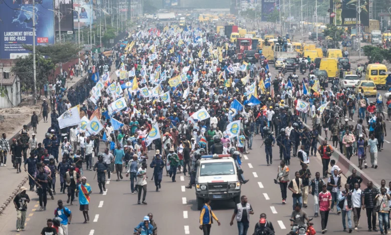 People march during Tuesday’s protest