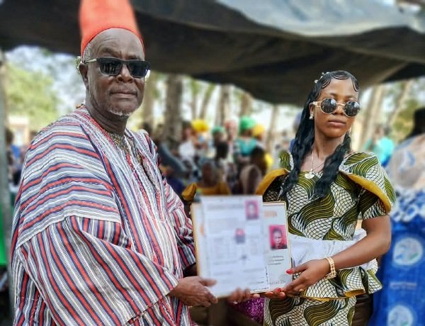 Naa Abdulai Salia (in smock), Chief of Ponyentanga, presenting an award at a durbar