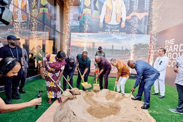 President Mahama (fourth from left) being assisted by Mr Ninquang (second from right) and some ministers of state to break ground for the commencement of the project