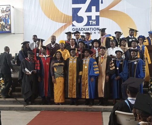 Prof. Daniel Ganu (fourth from right) with other dignitaries and some graduands during the graduation ceremony