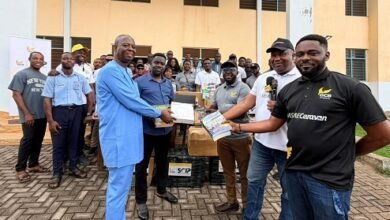 Officials of the bank handing over the items to the school
