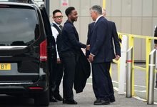 Raheem Sterling, second left, arrives at Basingstoke Magistrates’ Court ahead of his first appearance accused of dangerous driving in Hampshire, yesterday