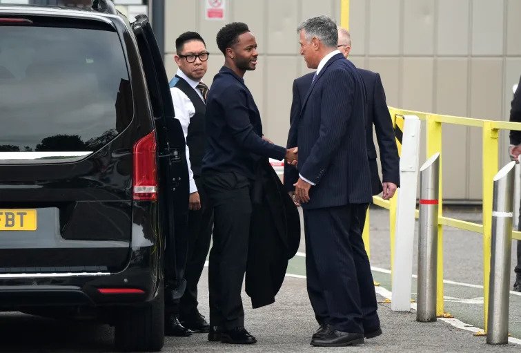 Raheem Sterling, second left, arrives at Basingstoke Magistrates’ Court ahead of his first appearance accused of dangerous driving in Hampshire, yesterday