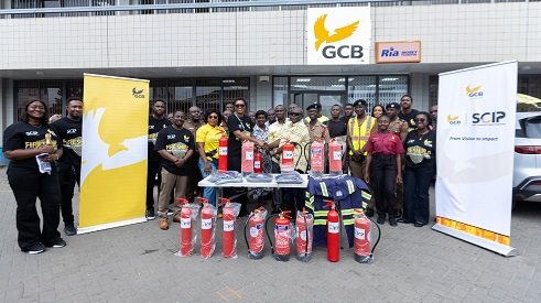 Representatives of the GCB Bank staff handing over the equipment to the hospital staff