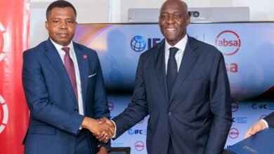 • Dr Botchway (left) in a handshake with Makhtar Diop, Managing Director, IFC