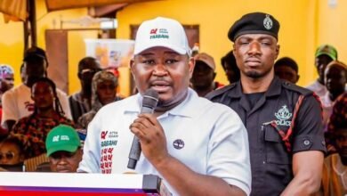 Mr Issah (inset) addressing the gathering