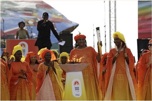 Some of the titled queens or royal women in Wolof display the torch at the procession