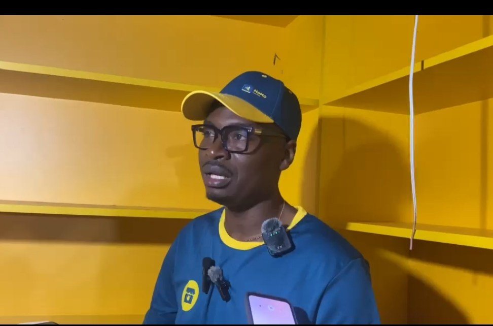 The Mobile Money Channel Development Manager, David Nana Addai, speaking with journalists