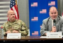 Rolf Oslon (right) with Maj Gen W. Brown